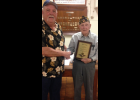 C. H. McIntosh (right) accepting award from Bill Englert.