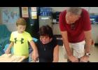 Fourth grader, Carter Kanoy with grandparents.