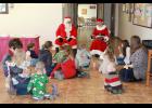 Mrs. Claus reads to the children at the JC Penney Expo.