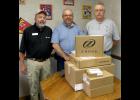 Pictured above are State Technical College Lead Instructor of Telecommunications Options Dan Ramsay (left), GHTC Plant Manager Gene Dinwiddie (center), and GHTC Central Office Supervisor Bill Peterson (right) alongside some of the donated fiber optic equipment.