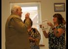 Alderman Fred Moss takes oath to uphold the Constitution