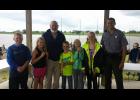 Kids enjoying Fishing Day along with Police Chief Ron Faulkner and Caldwell County Conservation Agent Justin Pyburn